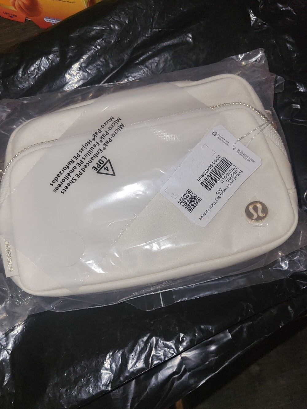 lululemon athletica Everywhere Crossbody Bag~Light Ivory~Gold Metal~NWT.